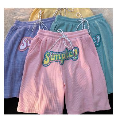 China Anti-wrinkle Pink Fashion Letter Appliques Wide Leg Loose Shorts Women Summer Loose Clothes Running Jogger Shorts for sale