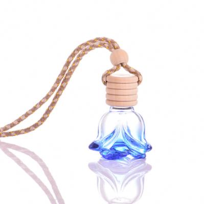 China Hot Selling Personal Care Rose 6ml Glass Car Air Freshener Perfume Bottle Empty Car Perfume Bottle for sale