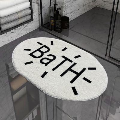 China Modern Oval Cashmere Floor Mat Letter Print Bath Mat Bathroom Rug Plush Carpet for sale