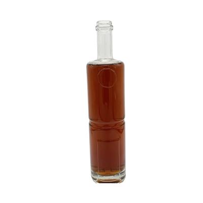 China Crystal White And Bright Transparent Glass Vodka Wine Bottle With Cork Liquor Bottle for sale