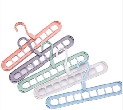 China Eco-Friendly Clothes Hanger Vendor Space Saving Magic Folding Multifunctional Set Plastic Clothes Foldable Clothes Hanger 9 Hole for sale