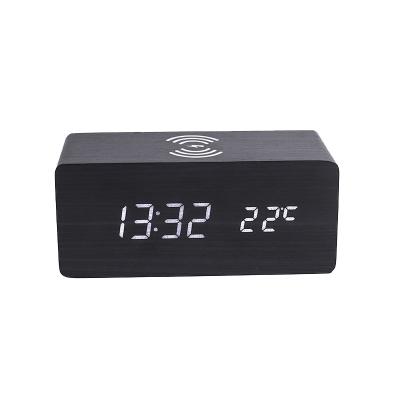 China Antique Style Wireless Wooden Cell Phone LED Alarm Clock Charger Sound Control Universal for sale