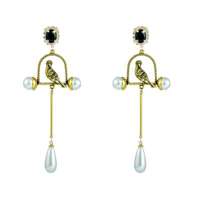 China Long Gold Plated Silver Needle Drop Pearl Earrings Gold Plated 925 Retro Personality Birdcage Court Silver Needle Earrings for sale