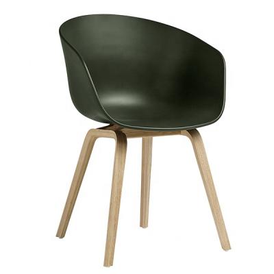 China Modern stylish multicolored plastic armchair with wooden legs for sale