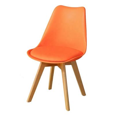 China Modern Slipcovered Tulip Chair Leather Chair Tulip PP Plastic Dining Chair With Solid Legs for sale