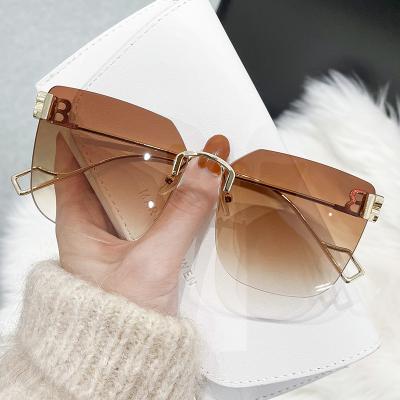 China 2022 Oversized Rimless Square Glass Sunglasses Womens Fashion Sun Glasses Vintage Brand Designer Retro Fashion Sunglasses Wholesale for sale