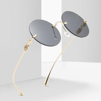 China Fashion sunglasses 2021 new fashion sunglasses frameless sunglasses metal round lens sunglasses for sale