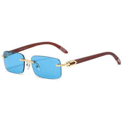 China Fashion sunglasses shape sunglasses for men and women summer 2021 new wooden leg square frameless sunglasses for sale