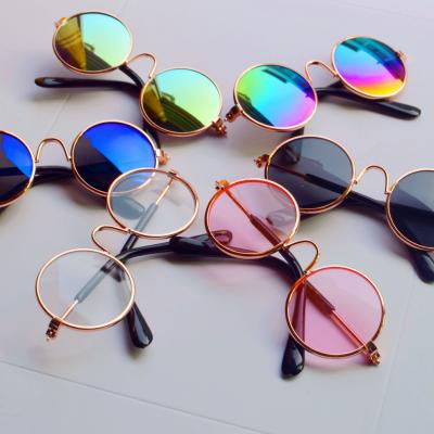 China 2021 Colorful Small Round Dog Cat Pet Sunglasses Creative Sunglasses Lovely Retro Circular Metal Frame for sale