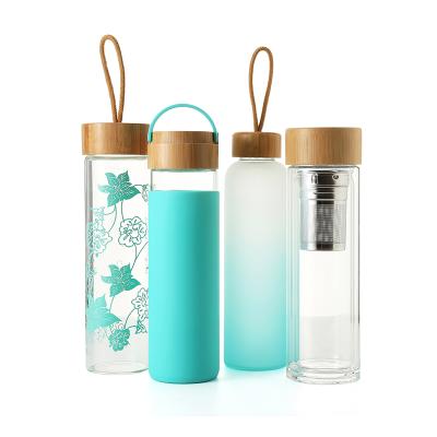 China Customized Sustainable Borosilicate Glass Bpa Free Frosted Water Bottle Portable Colored Glass Water Bottles for sale