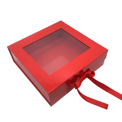 China Custom Materials Logo Recycled Red Magnetic Christmas Ribbon Cardboard Gift Packaging Cosmetic Folding Window Box With Clear PVC Window for sale