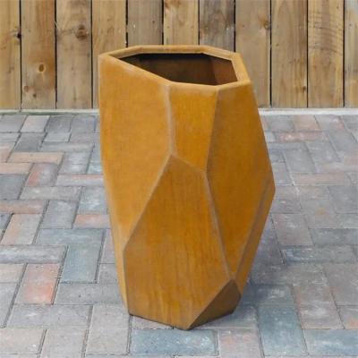 China Outdoor Corten Steel Planters Metal Circle Statue Succulent Flowers Pot for sale