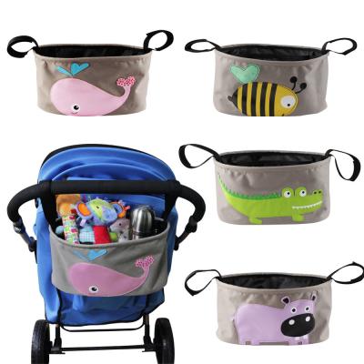 China Uweld Comfortable Multifunctional Stroller Organizer Bag, Diaper Bag, Paper Bag and Cup Holder Bag for sale