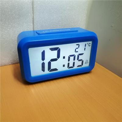 China LUMINOVA LCD Digital Hourly Chime Talking Alarm Clock with Light with Cuckoo and Music with Nap with Temperature for sale