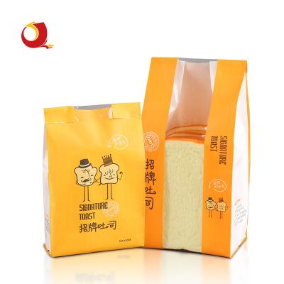 China Soft Packaging Food Grade Rack Up Square Bottom Bread Pouch With Clear Window Paper Packing Bag For Toast Bread for sale