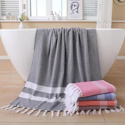 China Lightweight Tassel Beach Towel Absorbent Soft Peshtemal Beach Towel for sale