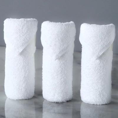 China Compressed wholesale 100% cotton white towel for hotel/spa/home for sale