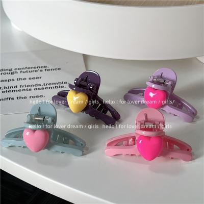 China Fashion 2022 Summer Fashion Headwear Candy Colored And Cute Girl Candy Color Heart Grab Clip Hair Accessories For Women for sale