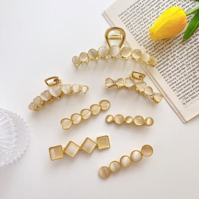 China 2021 Retro Fashion Women Headdress Simple Heart Series Geometric Platypus Clip Cat's Stone Girl Shark Clip Hairpin for sale