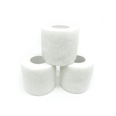 China Avoid Injuries 5cm*4.5m Self Adhesive Cohesive White Waterproof Medical Bandage For Bonding for sale