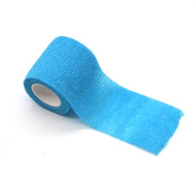 China 5*450cm Blue PP Medical Elastic Cohesive Bandage Nonwoven Colored Adhesive Tape for sale