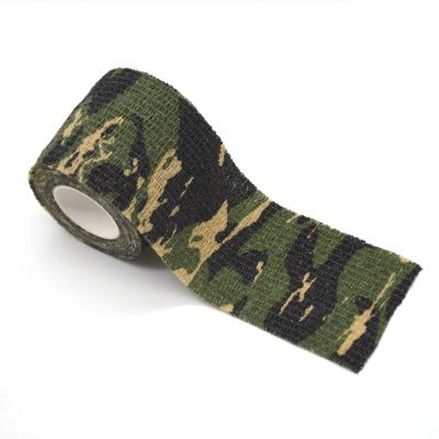 China Avoid Injury Camouflage Shape Nonwoven Fabric Self Adhesive Camouflage Military Bandage Camouflage Cohesive Bandage For Outdoor Military Hunting for sale