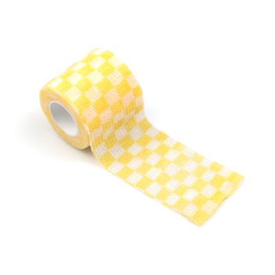 China Avoid Injuries Cartoon Prints Elastic Self Cohesive Colorful Adherent Waterproof Elastic Bandage for sale