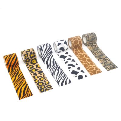 China Avoid Injuries Nonwoven Animal Printed Self Adhesive Elastic Bandage For Tattoo Grip Elastic Cohesive Bandage For Pets Wrap for sale