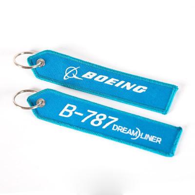 China Custom machine woven key holder wholesale price logo keychain embroidery patch key indicator for sale