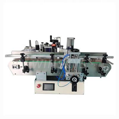 China Mini small labeler table positioning top of products around glass plastic bottle labeling machine for sale