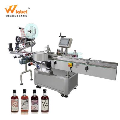 China Automatic Commodity Good Quality Round Wheel Bottle Labeling Machine For Wine for sale