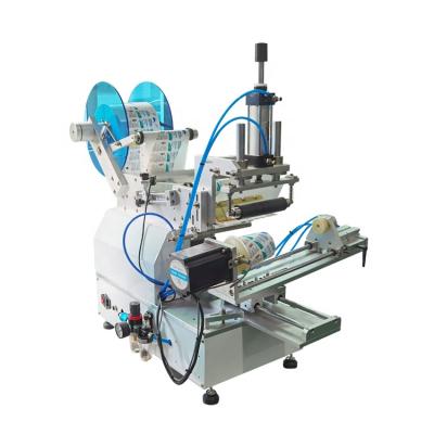 China Tabletop Semi Automatic Cone Round Bottle Commodity Sticker Applicator Adhesive Labeling Machine For Conical Container for sale