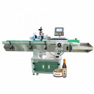 China Durable Automatic Commodity Water Bottle Round Aluminum Cans Name Adhesive Sticker Labeling Machine With Date Code for sale