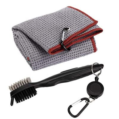 China Compressed Microfiber Waffle-Weave Golf Towel With Brush for sale