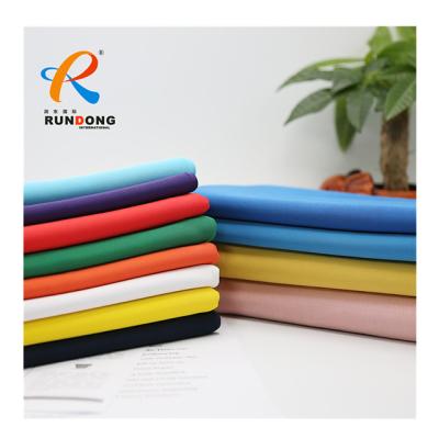 China Rundong Anti-Static Stock Pleated 240 Gsm 100% Cotton For Work Wear School Uniform Work Wear Cotton Twill Medical Uniform Fabric for sale