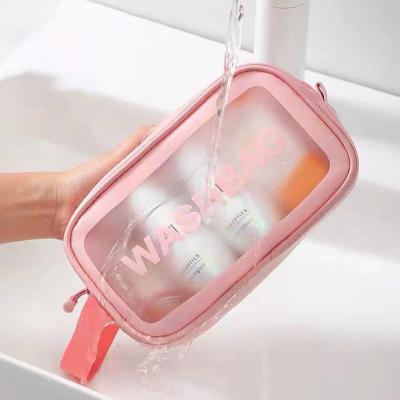 China Clear Logo Clear Logo Makeup Bag Washable Custom Waterproof Beauty Skin Care Bag For Women Men for sale