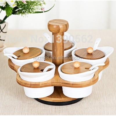 China Lazy susan spice spinning set, ceramic spice jars and spoons with bamboo holders wholesale for sale