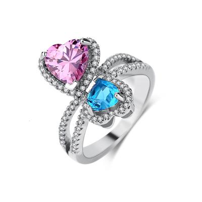 China Designer Inspired Trendy Designer Inspired Blue Pink Cubic Zirconia Love Heart Wedding Jewelry Rhodium Plated Brass Ring for sale