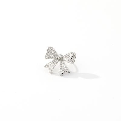 China Fashion Individuality Ladies Bow To Form Zircon Micro Rhodium Plated Silver Needle Earring Cuff One Piece for sale