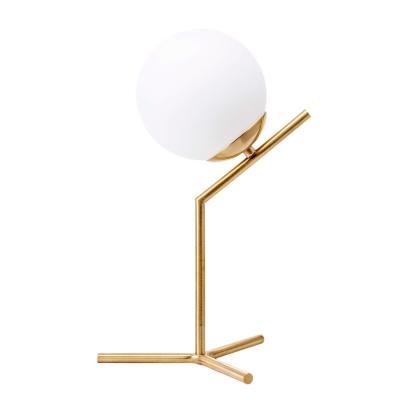 China Modern Luxury Table Lamps Light Luxury Modern Glass Iron Creative Book Lighthouse Bed Room Metal Sphere Brass Table Lamp for sale