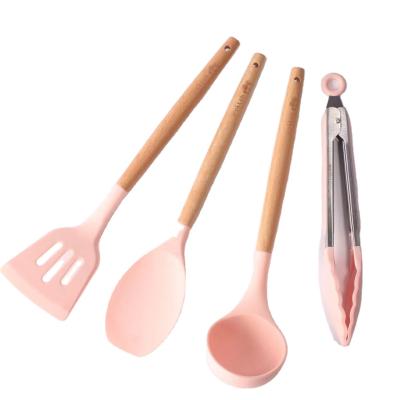 China Sustainable Four-Piece Silicone Kitchenware With Wooden Handle Non-Stick Cooking Tools for sale