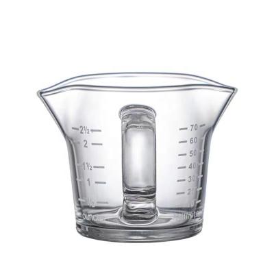 China Sustainable Cold And Heat Resistant Double Mouth Thickened Glass Measuring Cup With Scale for sale