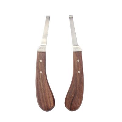 China Cuchillo profesional para cortar pezuñas con hoja de acero y mango de madera para técnicas avanzadas diestra en venta