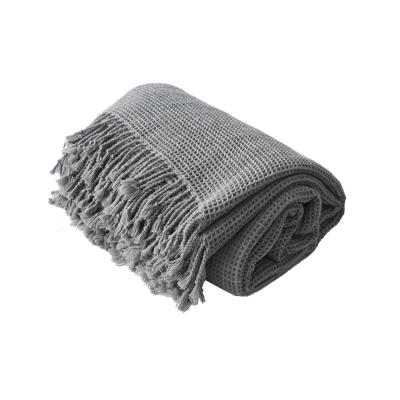 China Shrink Latest Heavy Duty Dark Spring Autumn Leisure Tassel Sofa Blanket Gray Waffle Thickened Knitted Style Baby Blanket Popular for sale