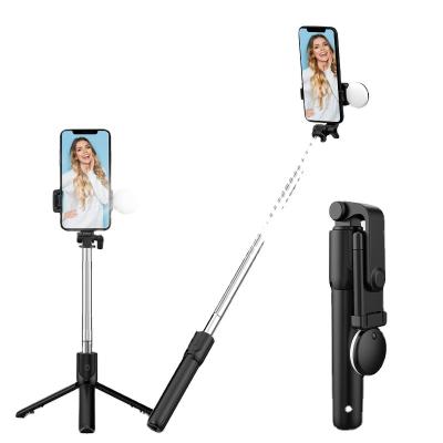 China Folding Wholesale R1X 71cm 360 Rotation Tripod With Fill Round Light Portable Selfie Stick for sale