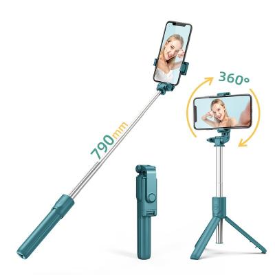 China Wholesale R1 67CM Foldable BT 360 Foldable Selfiestick Radio Selfie Stick Rotating Selfstick Tripod With Remote for sale