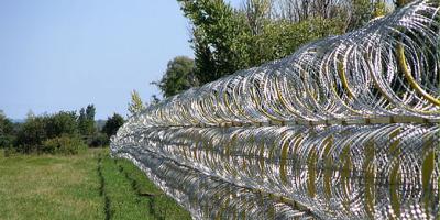 China Professional Concertina Razor Wire Fencing For Parking Places / Railway Stations for sale