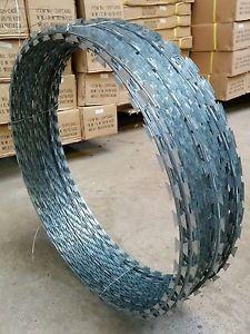 China Silver Blue Green High Tensile Concertina Wire Fencing , Razor Blade Wire Fence for sale