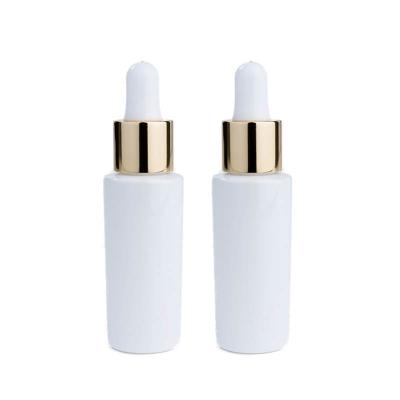 China 30ml White Cylindrical Smooth Glass Bottle With Golden/Silver Drop For Empty Dropper Bottle for sale