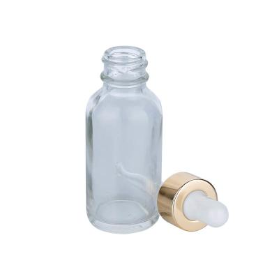 China 10/40ml Transparent Cylindrical Clear Glass Bottle With Golden/Silver Drop For Empty Dropper Bottle for sale